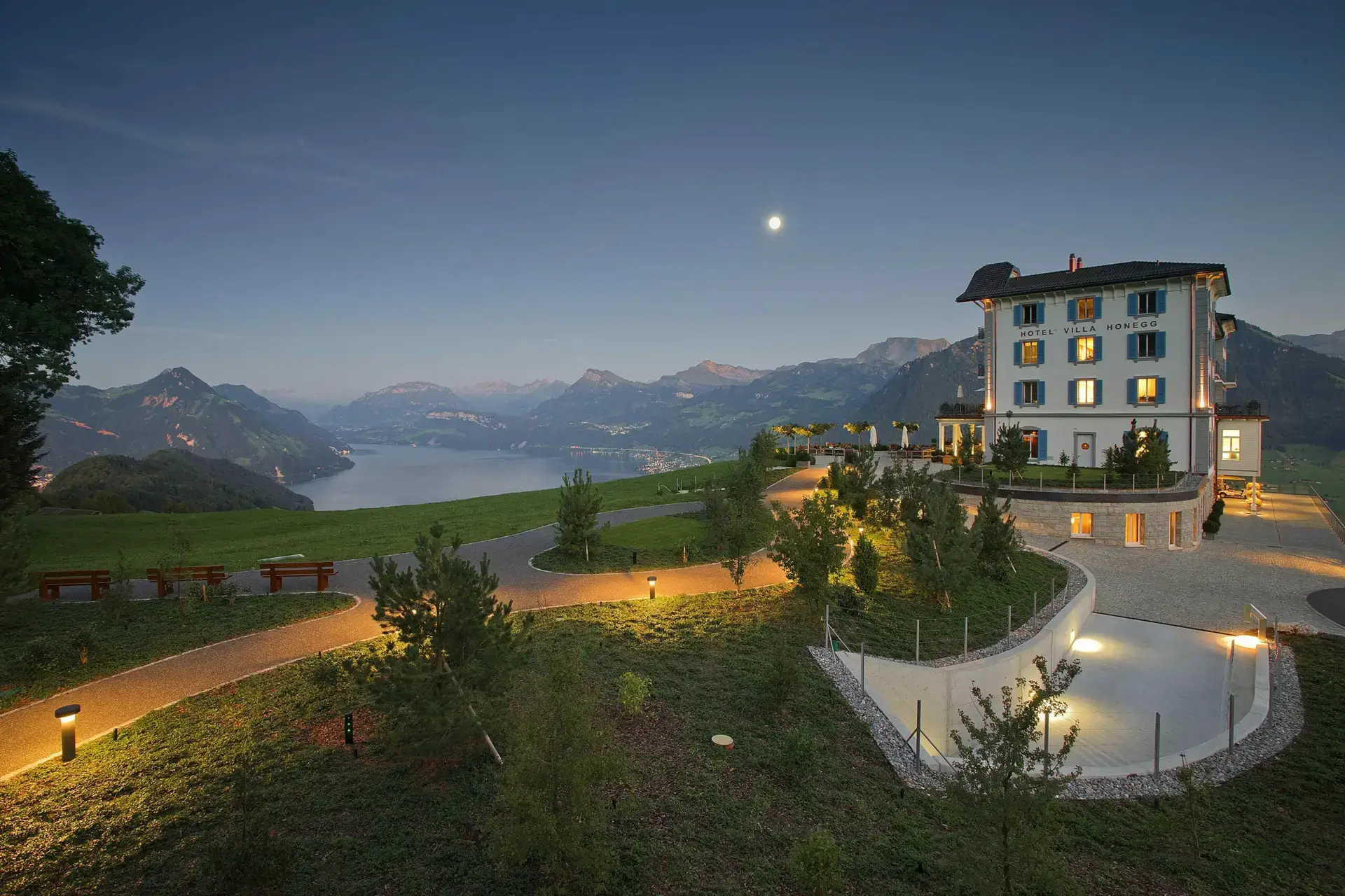Panoramic view of Villa Honegg overlooking the Swiss Alps and Lake Lucerne.